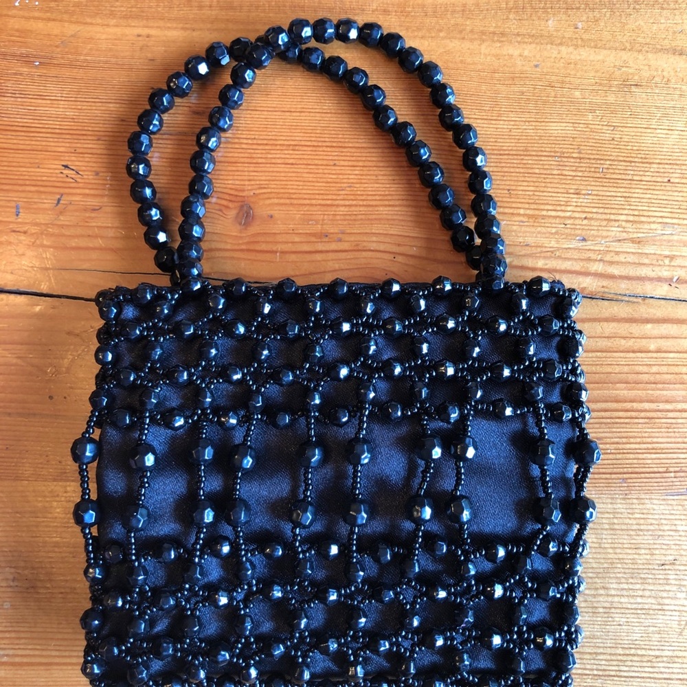 Vintage beaded wristlet mini bag.